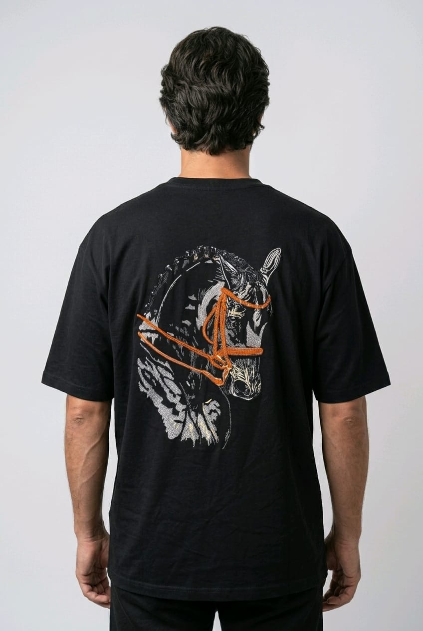 "Anetoonz premium black oversized streetwear T-shirt for men with half sleeves and custom equestrian-themed embroidery on the back."