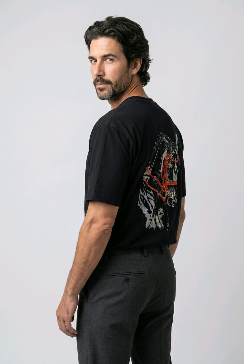 "Anetoonz premium black oversized streetwear T-shirt for men with half sleeves and custom equestrian-themed embroidery on the back."