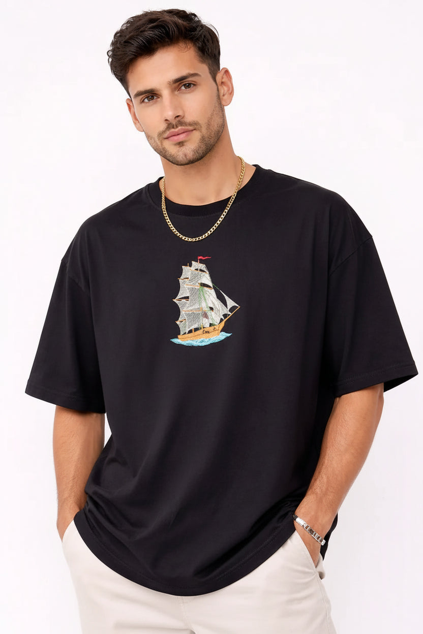 "Anetoonz premium oversized black streetwear T-shirt for men with half sleeves and a custom nautical ship embroidery design."