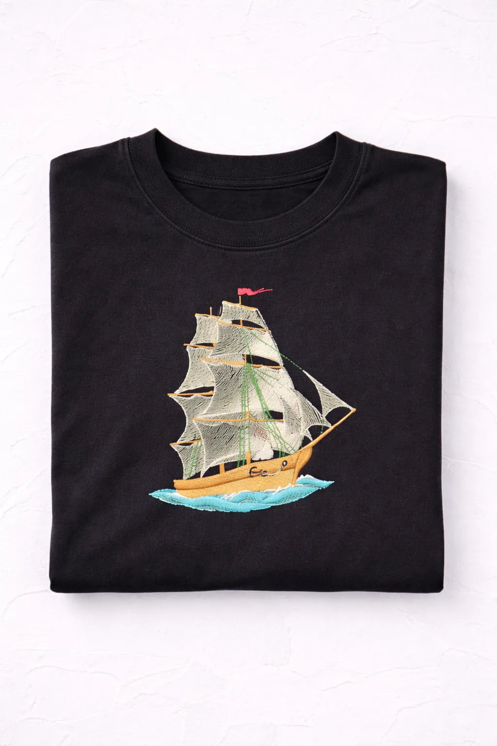 "Anetoonz premium oversized black streetwear T-shirt for men with half sleeves and a custom nautical ship embroidery design."