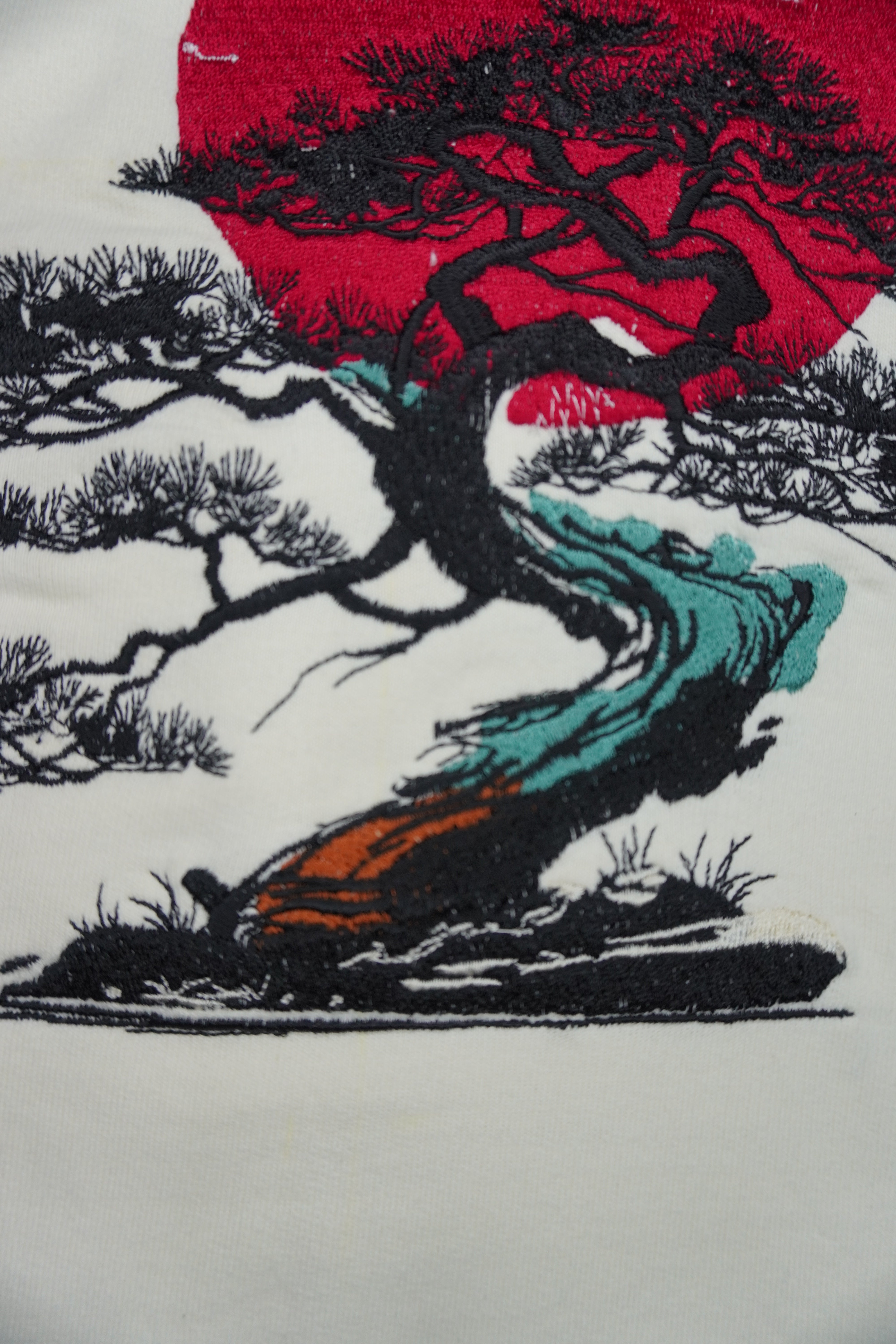 
"Anetoonz premium off-white oversized T-shirt for men with half sleeves and a custom  bonsai tree embroidery design."
