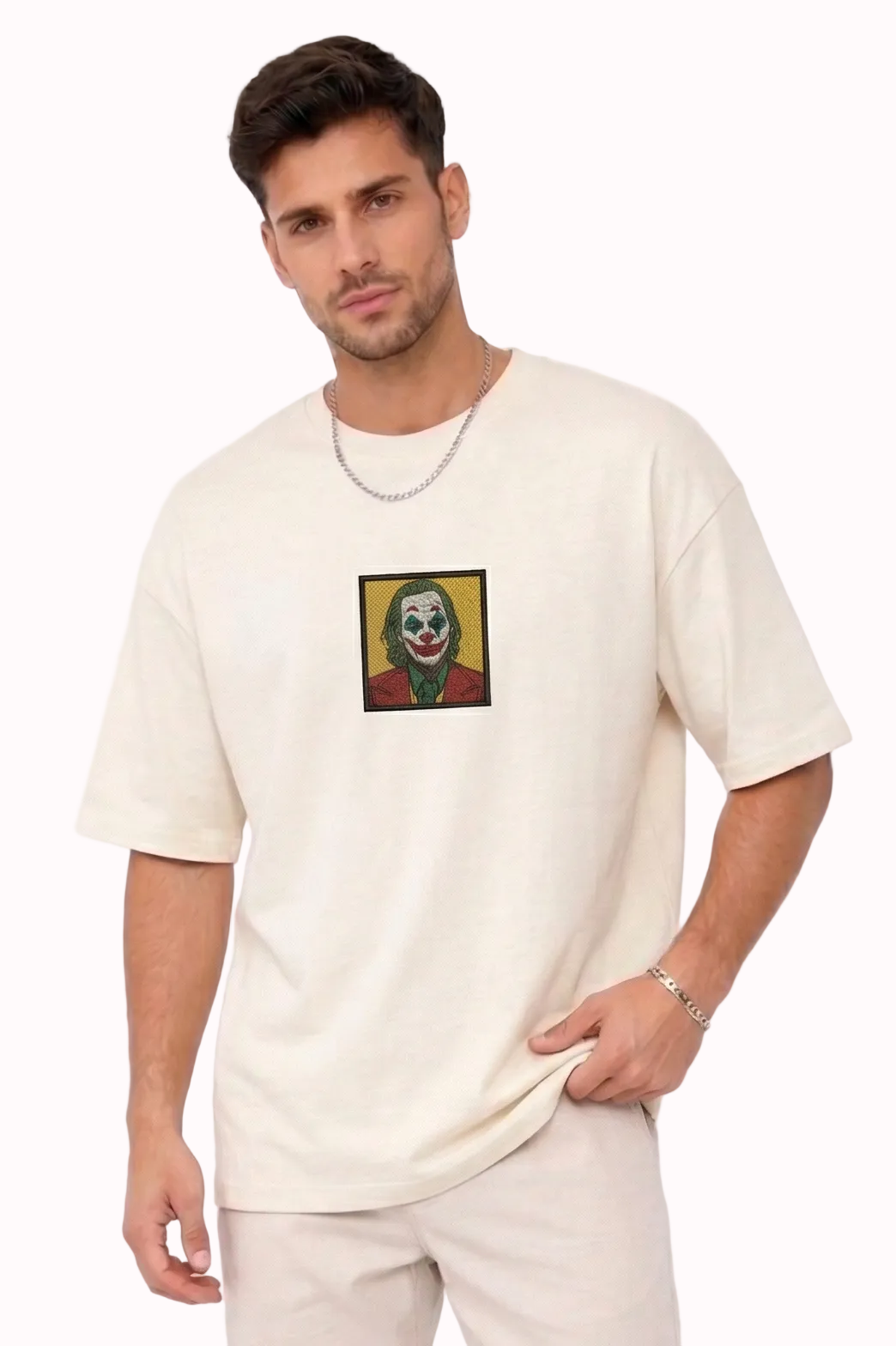 "Anetoonz premium off-white oversized streetwear T-shirt for men with half sleeves and a custom character embroidery design."