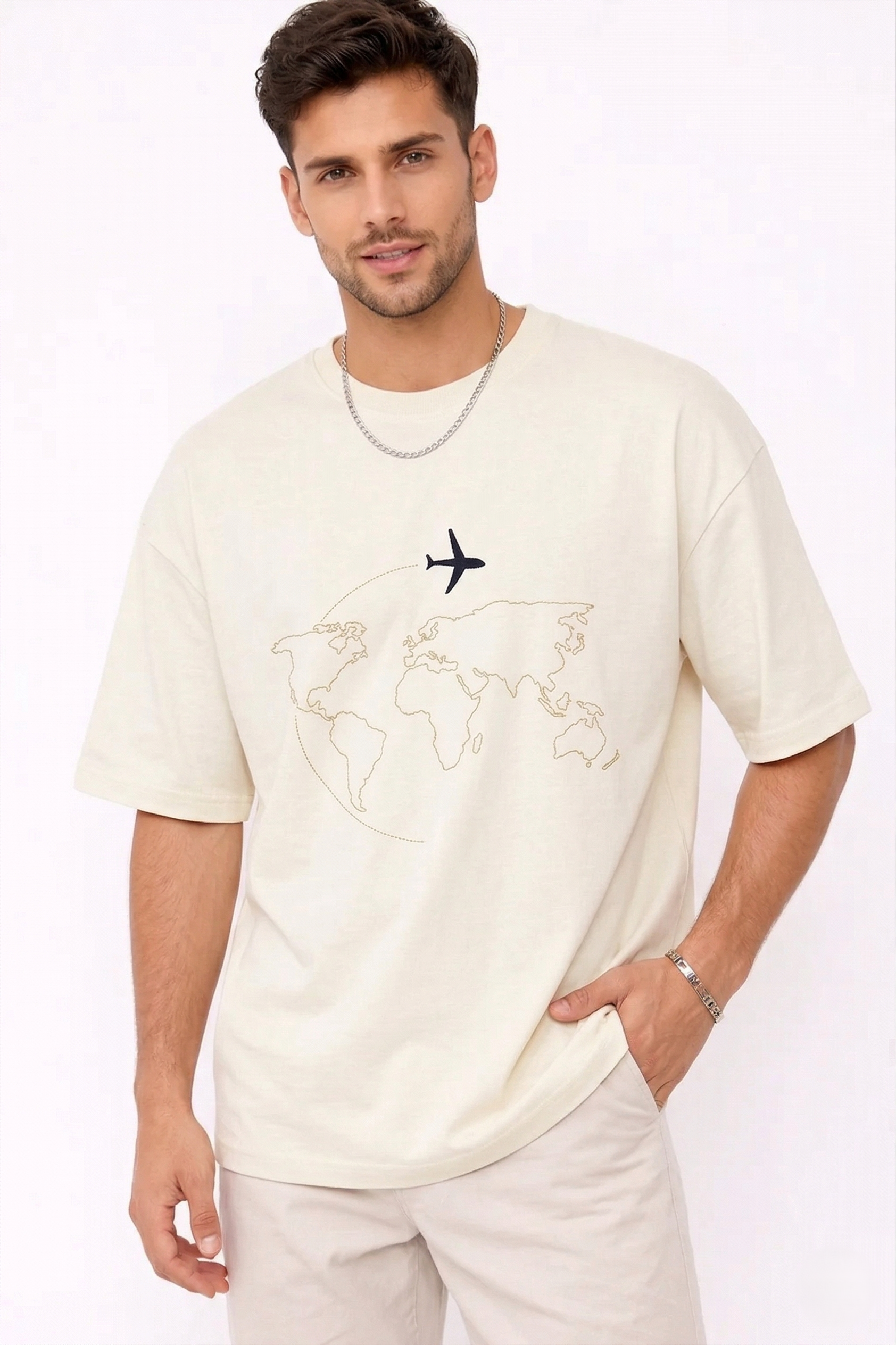 "Anetoonz premium off-white oversized streetwear T-shirt for men with half sleeves and custom travel-themed world map embroidery."