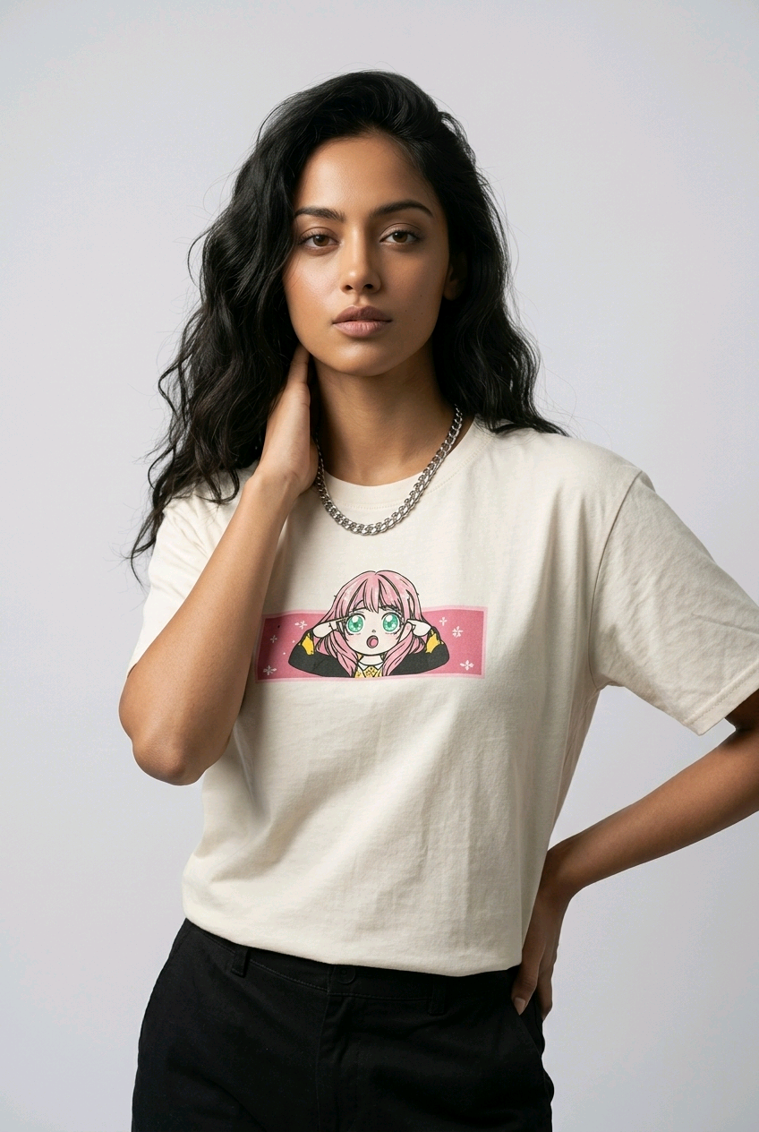 E-commerce product shot of an Indian model in a premium off-white streetwear t-shirt with detailed custom anime embroidery and a silver chain necklace.

