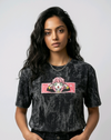 Fashion e-commerce shot of an Indian model in an acid-wash streetwear t-shirt with custom anime embroidery and a silver chain necklace.