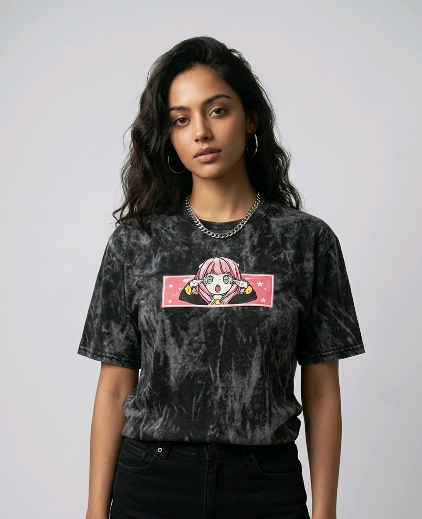 Fashion e-commerce shot of an Indian model in an acid-wash streetwear t-shirt with custom anime embroidery and a silver chain necklace.