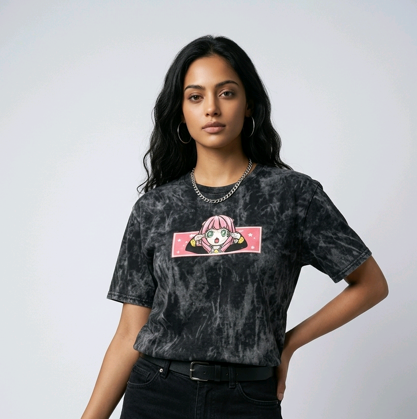 Fashion e-commerce shot of an Indian model in an acid-wash streetwear t-shirt with custom anime embroidery and a silver chain necklace.
