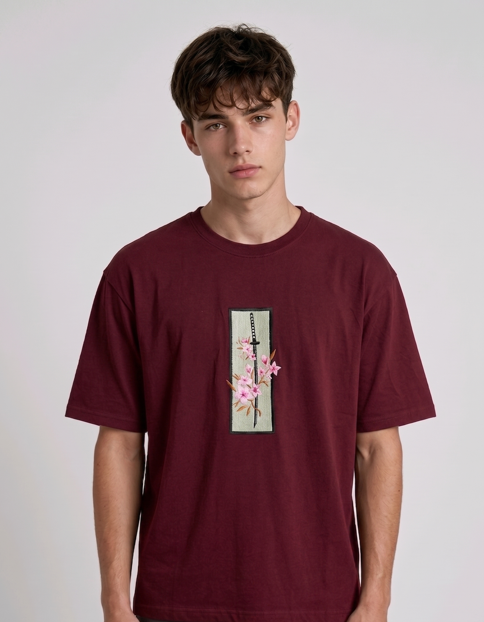 "high-density direct embroidery" to emphasize the premium quality and design technique.