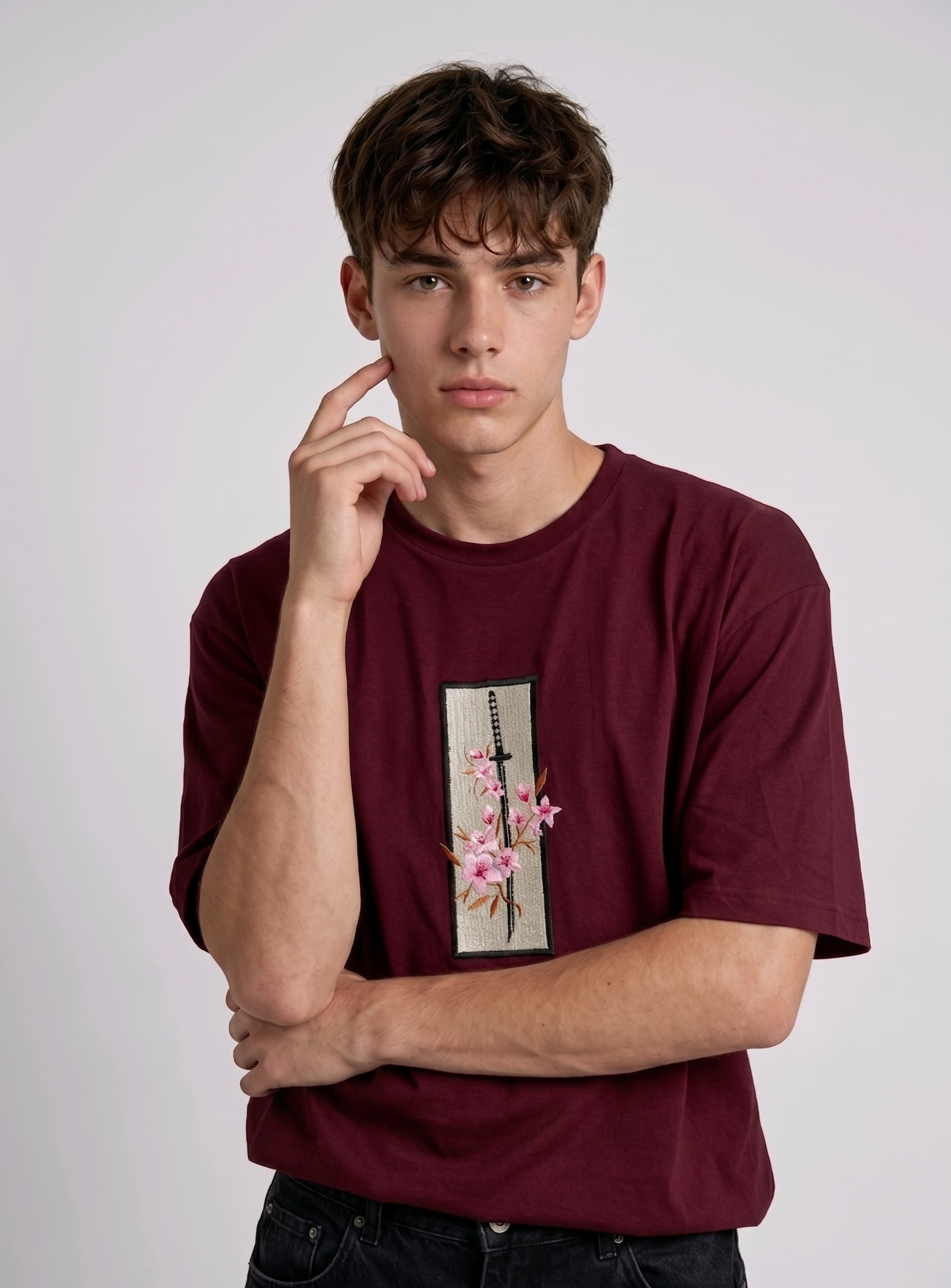 "high-density direct embroidery" to emphasize the premium quality and design technique.