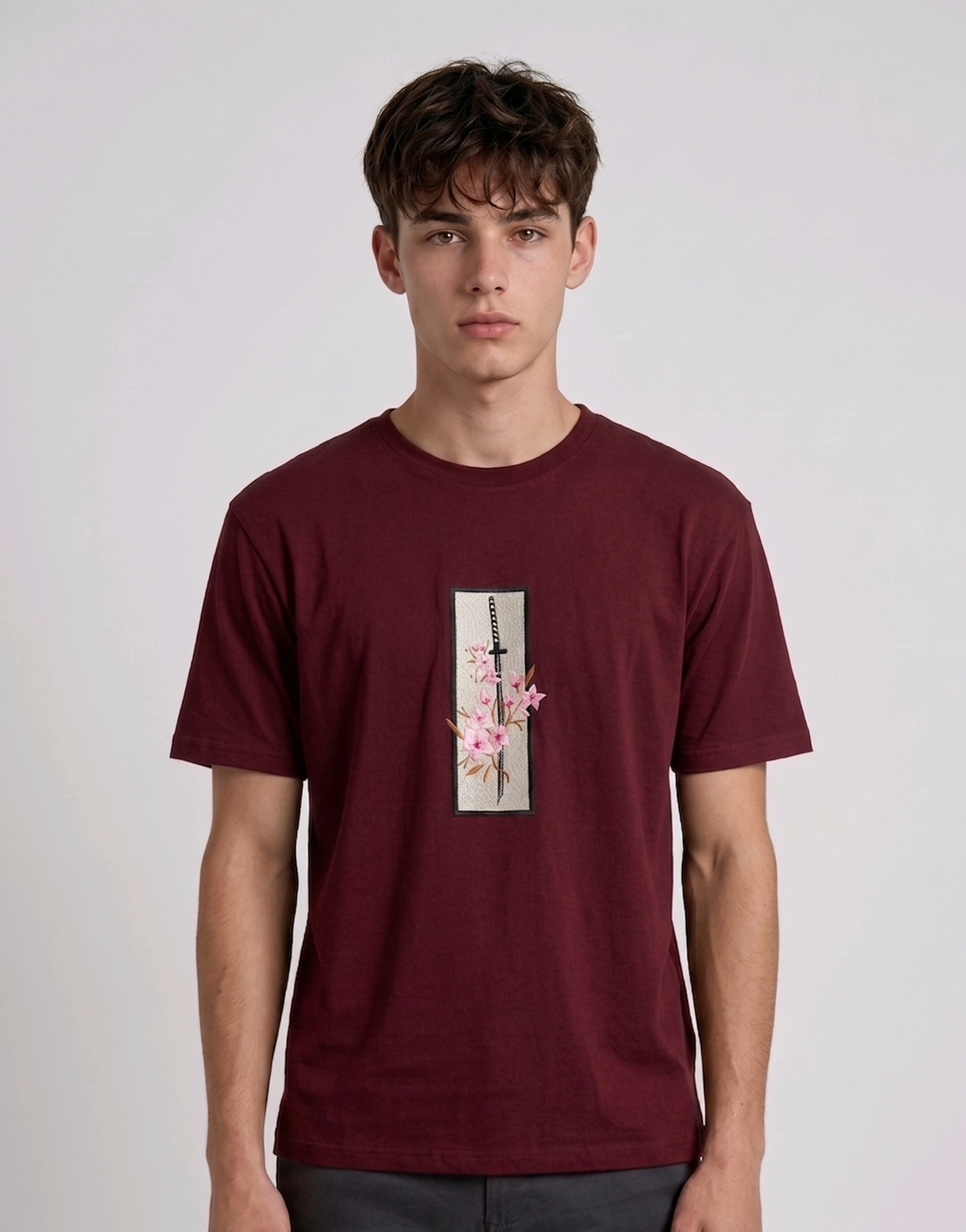 "high-density direct embroidery" to emphasize the premium quality and design technique.
