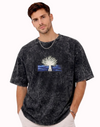 "Anetoonz premium streetwear: oversized acid-wash black T-shirt for men featuring custom anime-inspired embroidery and half sleeves."