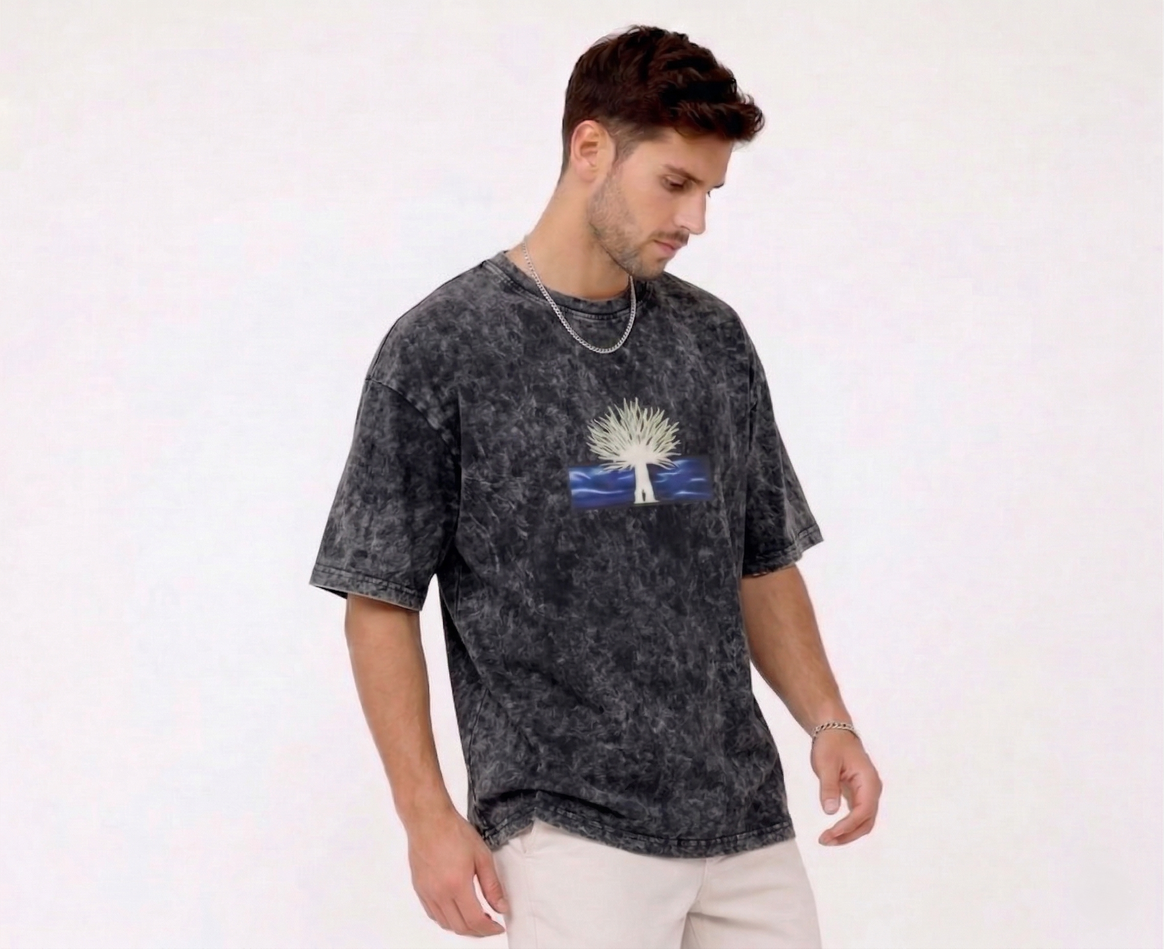 "Anetoonz premium streetwear: oversized acid-wash black T-shirt for men featuring custom anime-inspired embroidery and half sleeves."