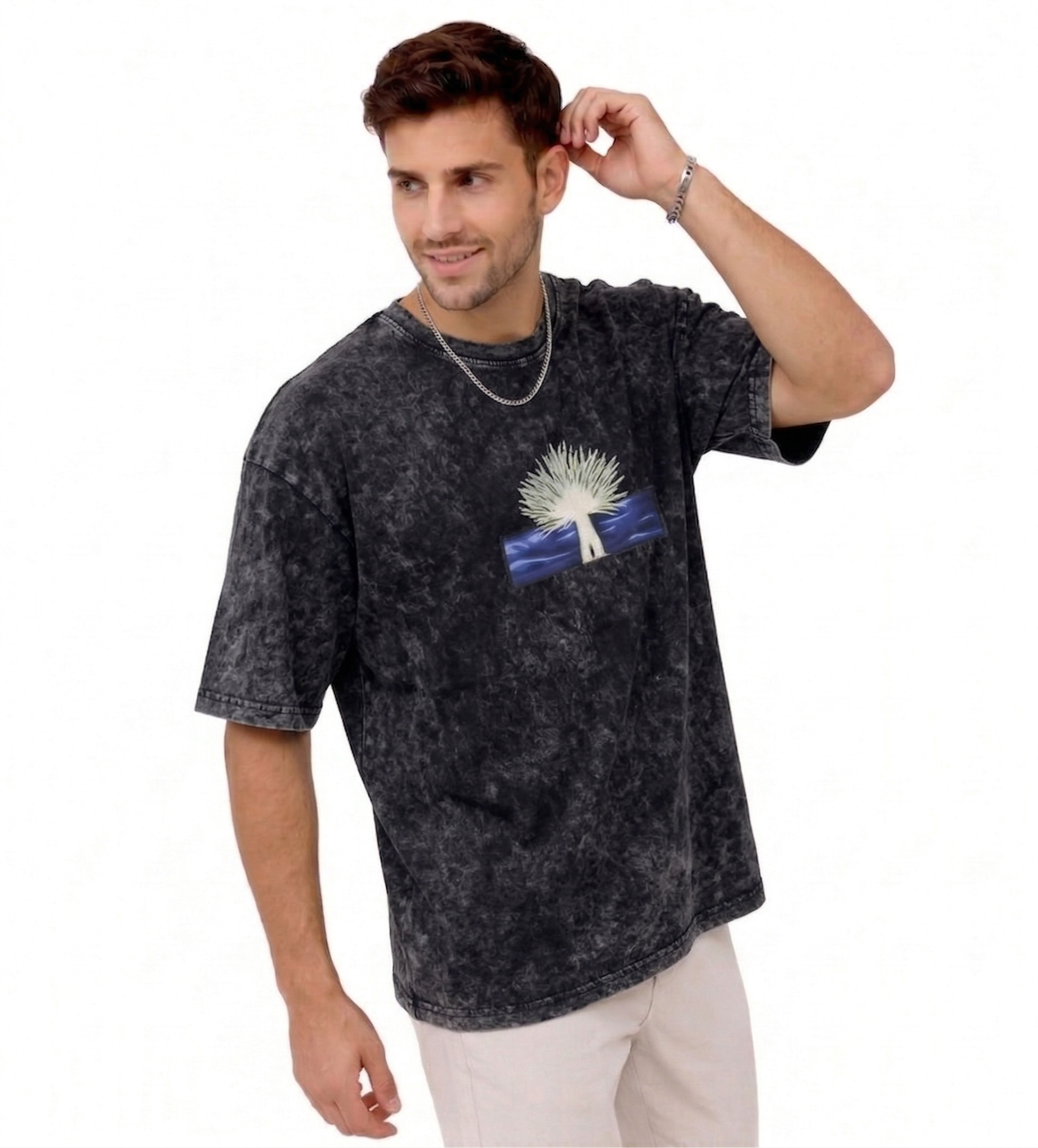 "Anetoonz premium streetwear: oversized acid-wash black T-shirt for men featuring custom anime-inspired embroidery and half sleeves."