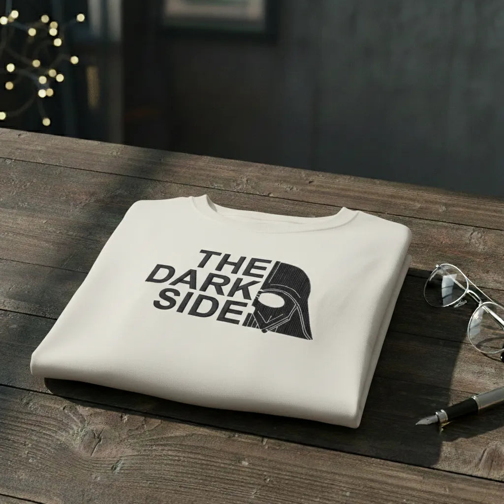 Man wearing beige T-shirt with "The Dark Side" text and split Darth Vader helmet graphic.