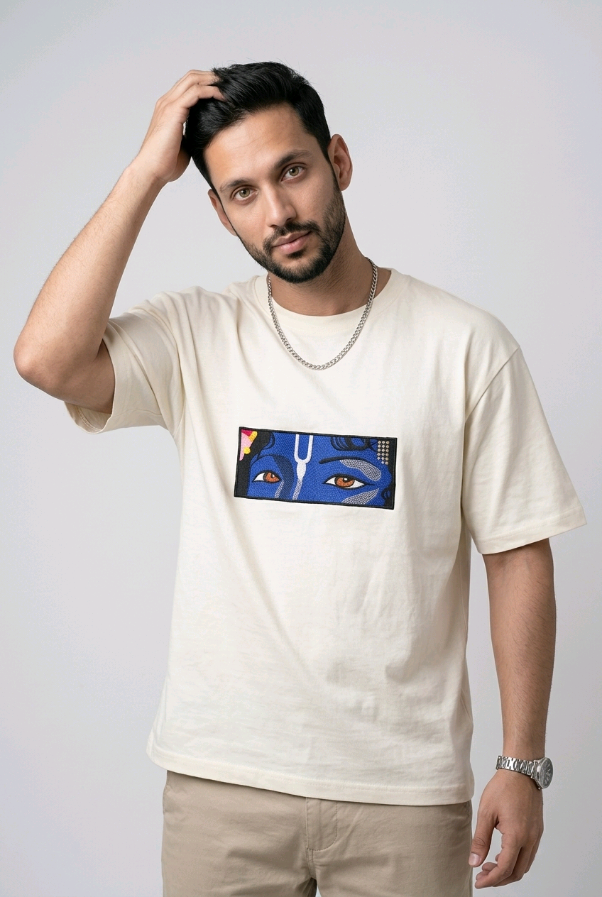 "Anetoonz premium off-white oversized T-shirt for men with half sleeves and a custom cultural embroidery design."