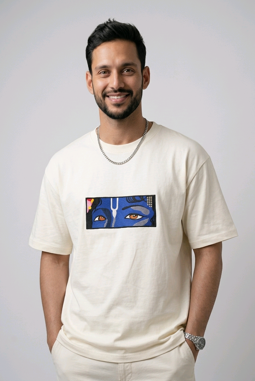 "Anetoonz premium off-white oversized T-shirt for men with half sleeves and a custom cultural embroidery design."