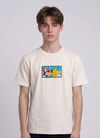 He is wearing  heavyweight cotton t-shirt with a detailed, colorful embroidered patch on the chest featuring anime characters Ash Ketchum (winking) and Pikachu.