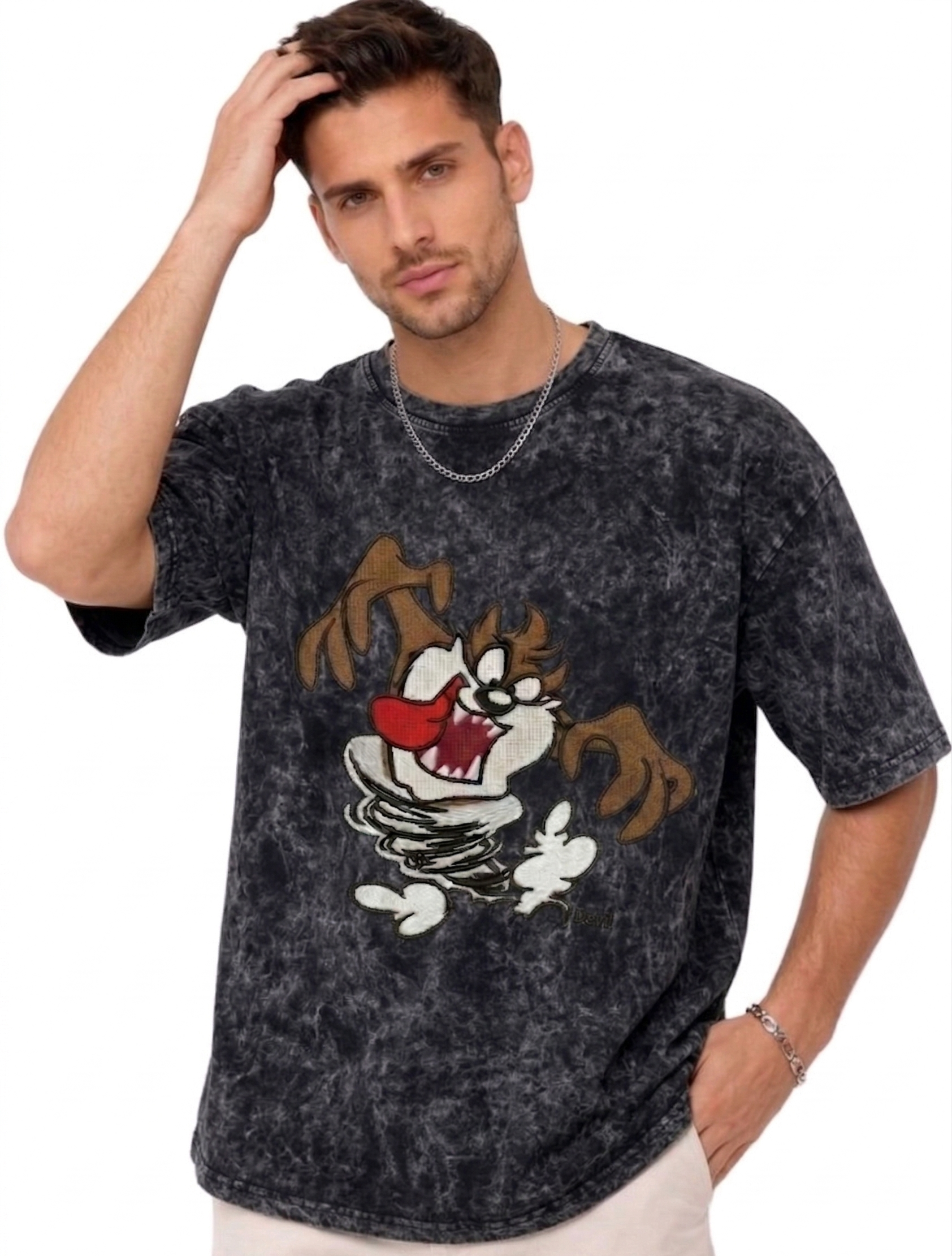 E-commerce product photo of a premium acid-wash streetwear t-shirt with custom character embroidery and a relaxed, oversized fit.