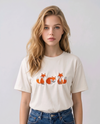 E-commerce model shot of a premium off white streetwear t-shirt with detailed animal embroidery and a relaxed fit.